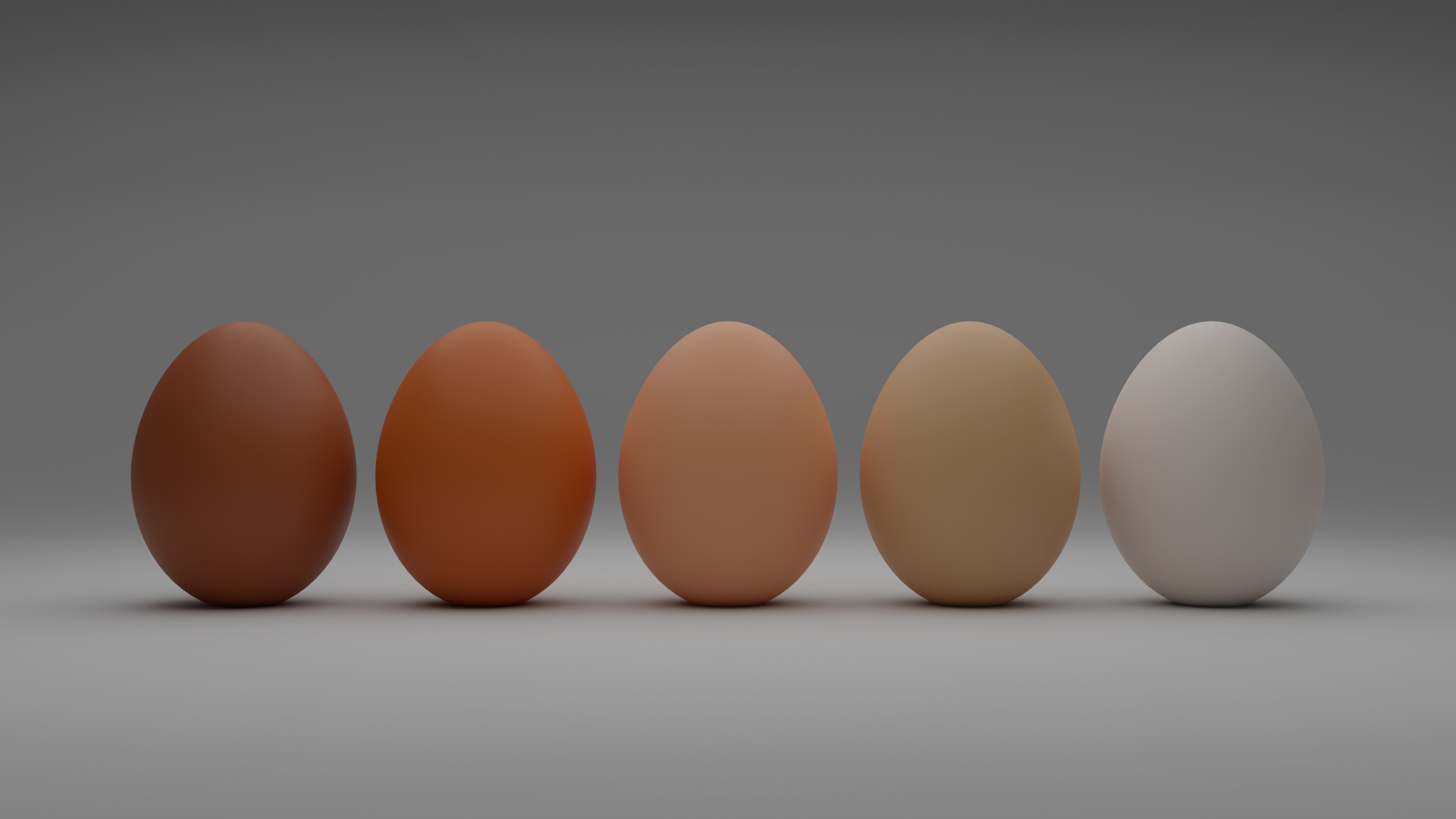 five raw eggs in line on a white surface